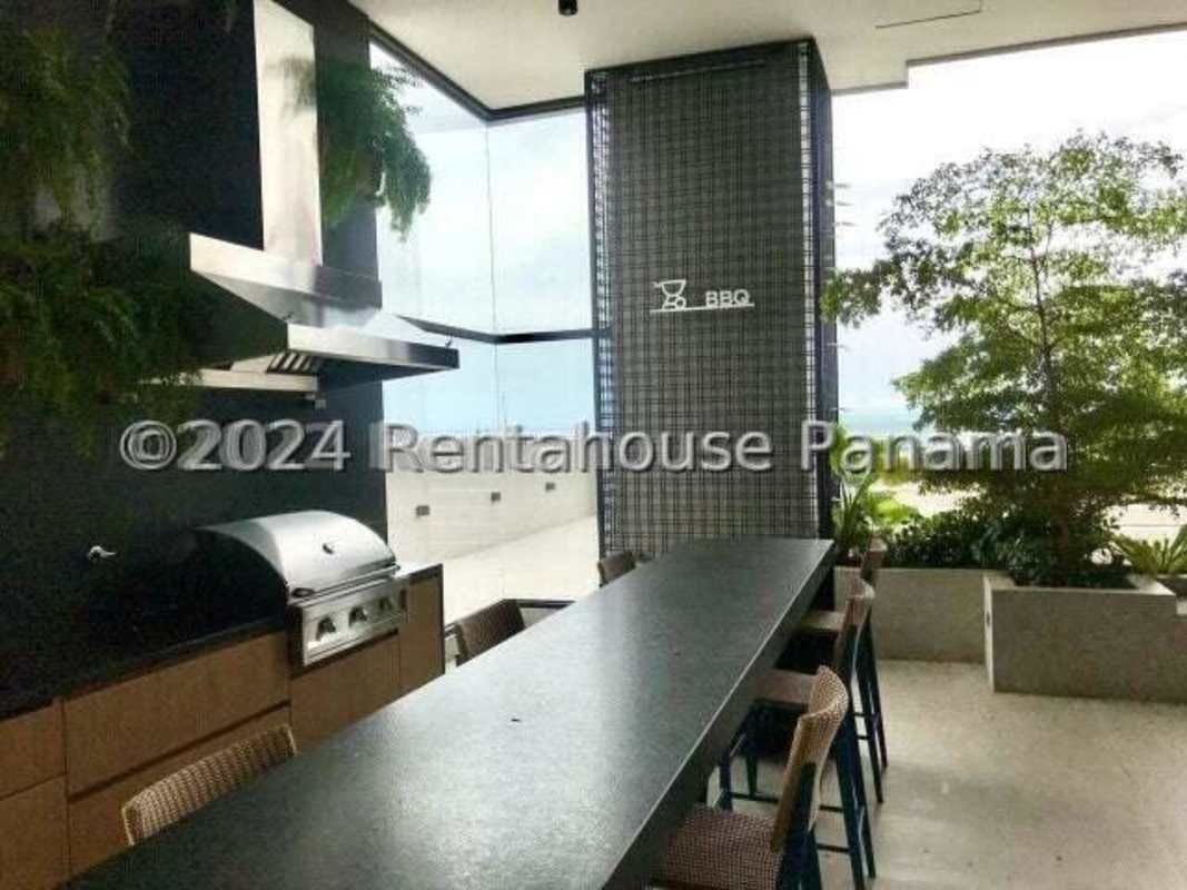 Modern illuminated facade of PH Victory Sport in Coco del Mar Panama City at night