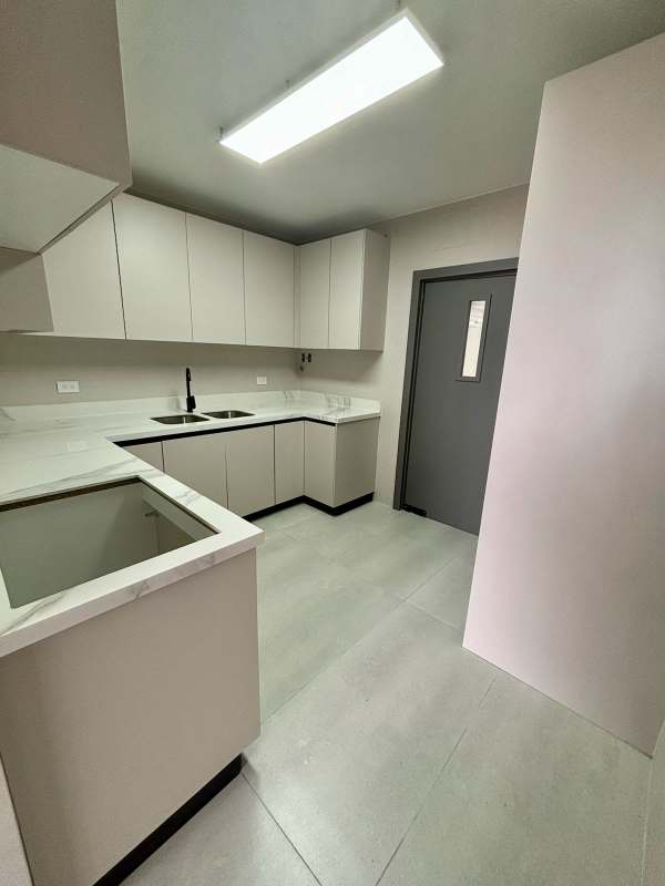 Remodeled kitchen with updated cabinets, tile backsplash PH Deveaux apartment Panama City