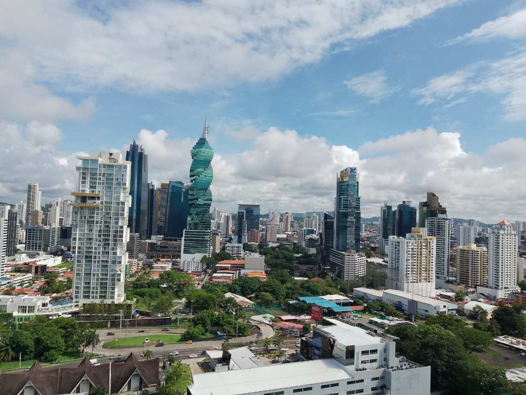 Master suite with walk-in closet and private bath at PH Arrecife apartment in Punta Paitilla Panama