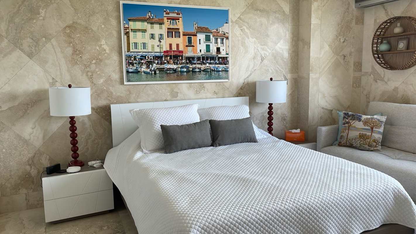 Bedroom with large windows facing Pacific Ocean, furnished at PH Coronado Country Club Las Lajas Panama