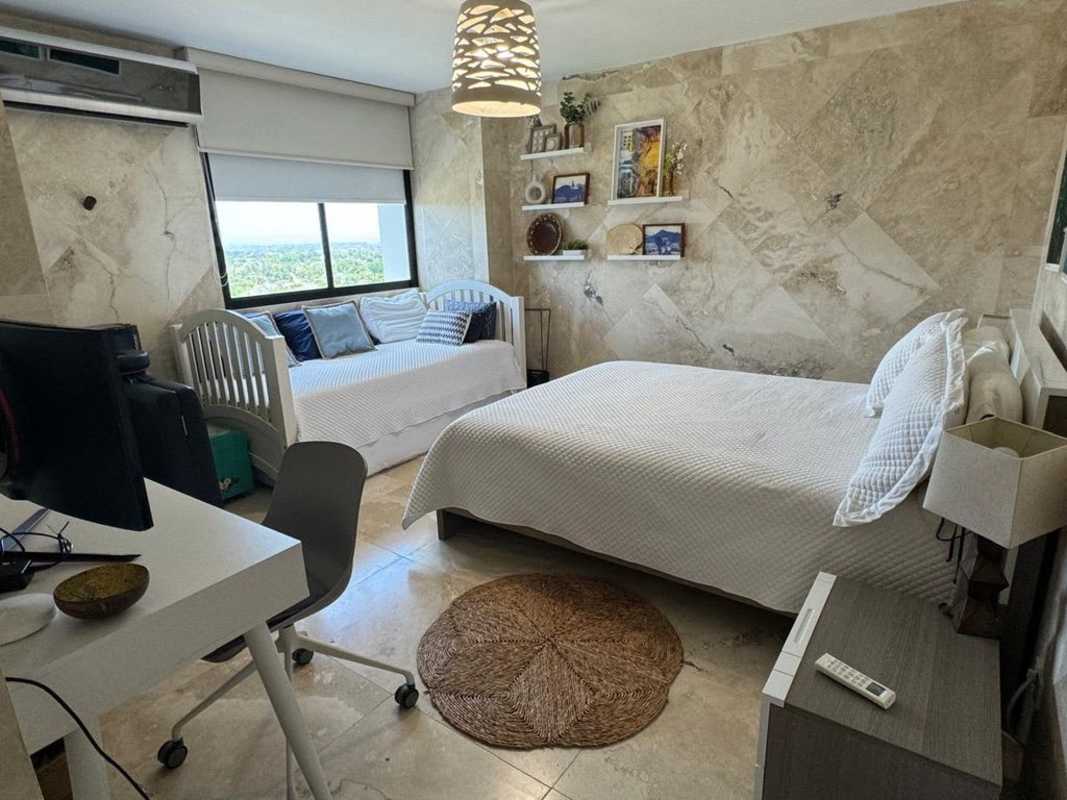 Modern coastal living room with floor-to-ceiling windows and ocean views at PH Coronado Country Club Las Lajas Panama