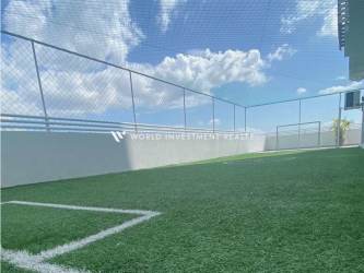 Outdoor rooftop mini soccer pitch with skyline view PH Punta Arenas Panama City