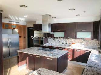 Luxury condo kitchen with granite island, stainless appliances PH Punta Arenas Punta Pacifica Panama