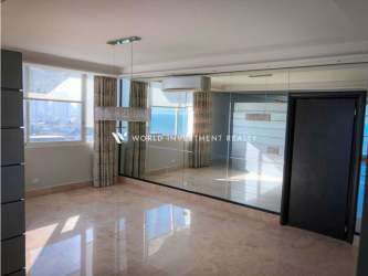 On-site gym with cardio equipment and free weights at PH Punta Arenas Punta Pacifica Panama