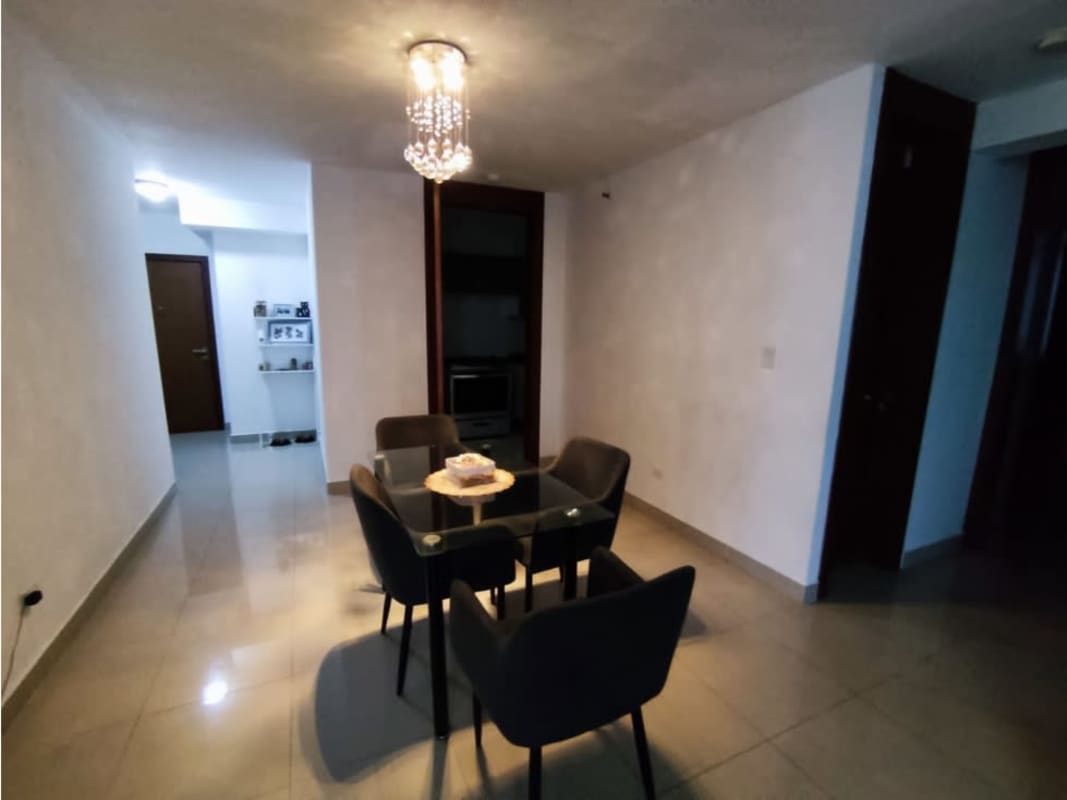 Bright living and dining room with balcony access fully furnished at PH Residencias del Sol