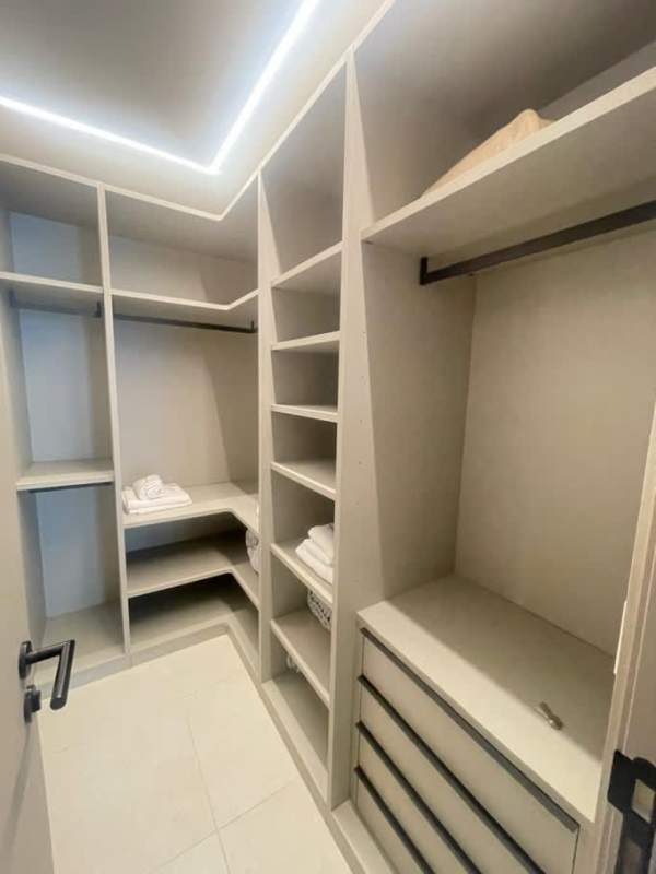 Open living dining area with large windows, modern furnishings PH Coco del Mar Panama