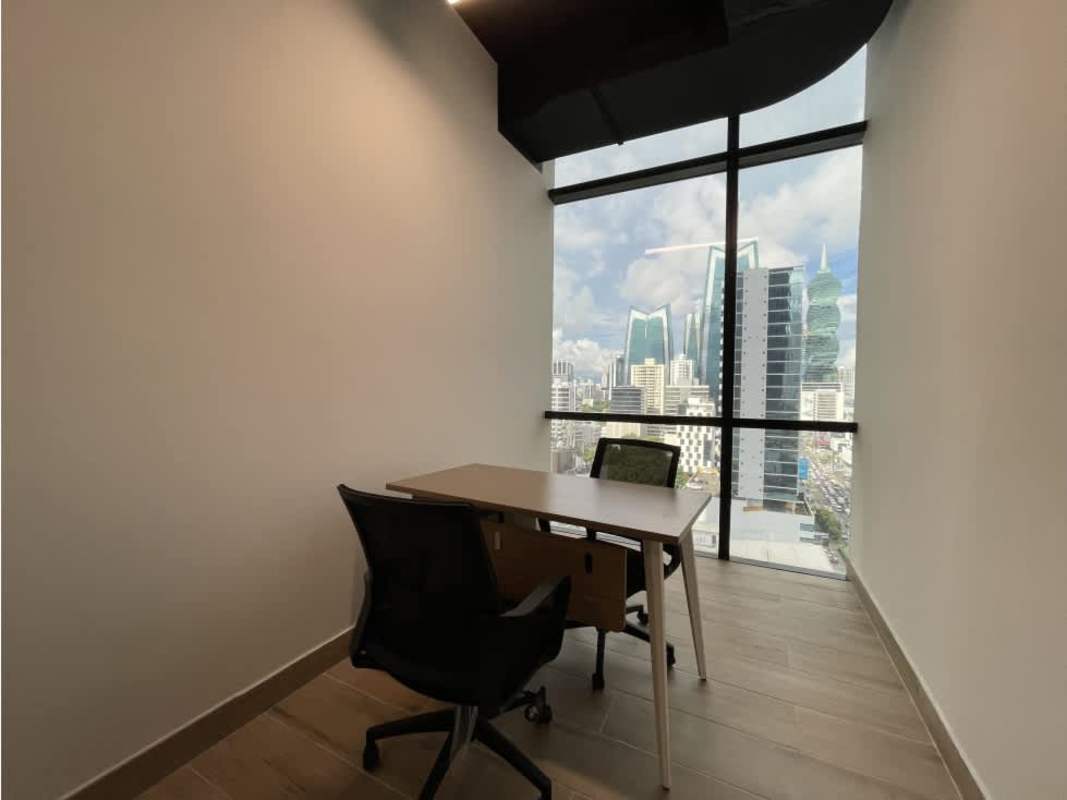 Executive private office with floor-to-ceiling windows overlooking Panama