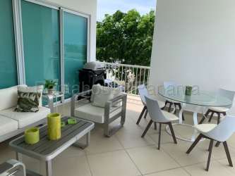 Bright open kitchen with granite countertops and modern appliances in ocean view condo Playa Blanca Panama