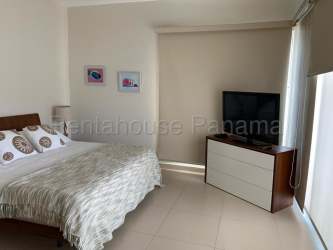 Spacious master bedroom with large window and ocean view Playa Blanca Condo Panama