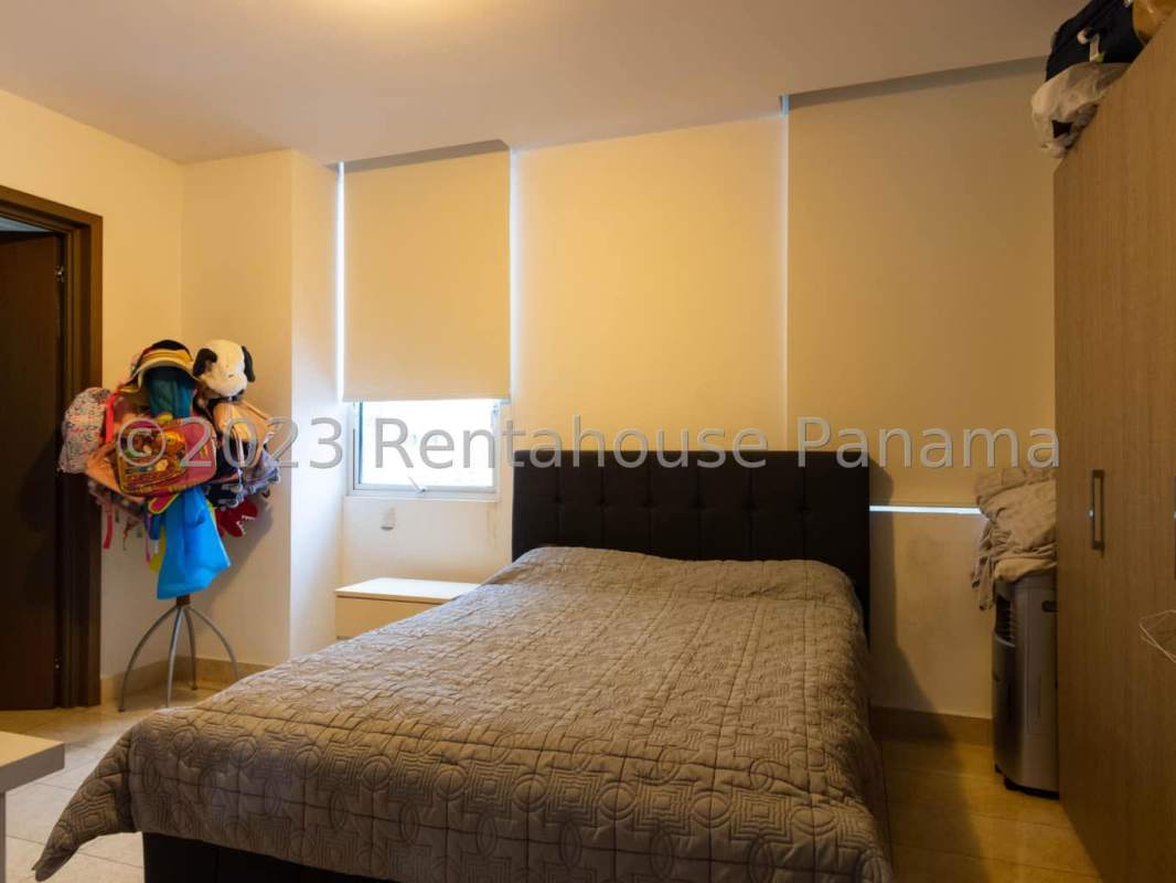 Kid's play area with toys, bright colors at PH Santorini luxury condo Coco del Mar Panama City