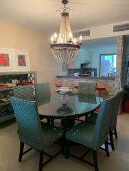 Spacious living dining open plan with modern furnishings in Bijao Balboa 1 beachfront condo Panama