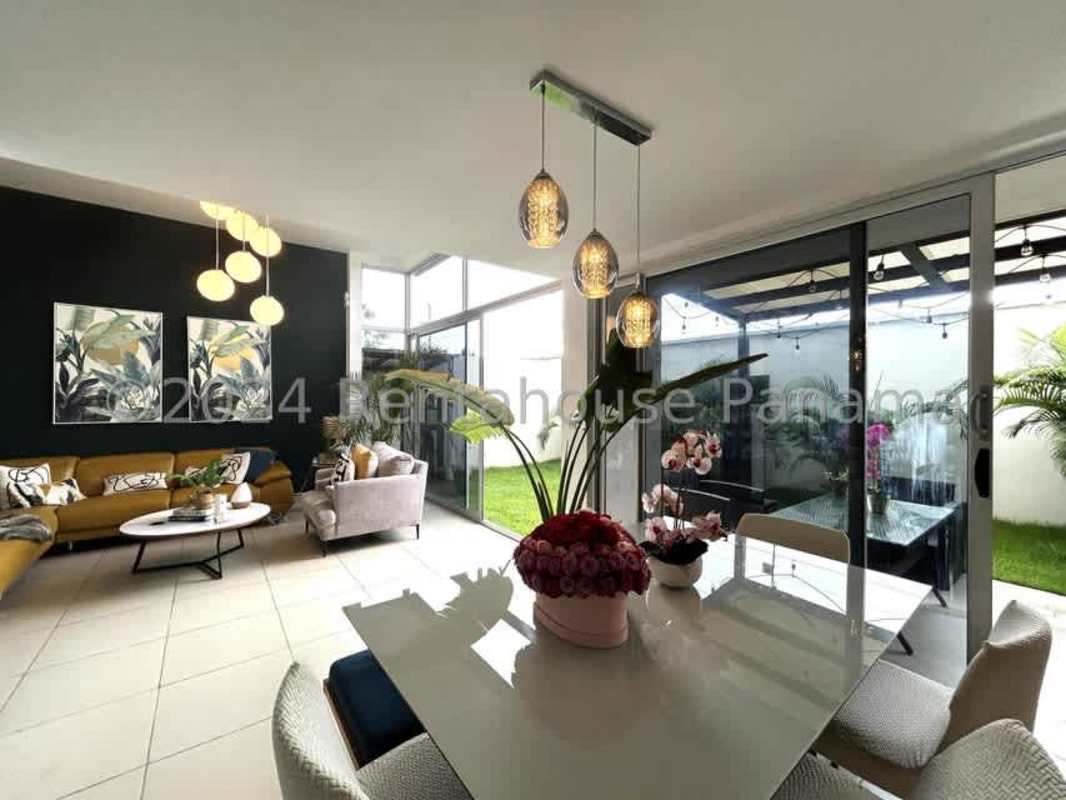 Large bedroom with balcony, air conditioning, neutral decor in Costa Sur Panama house for rent