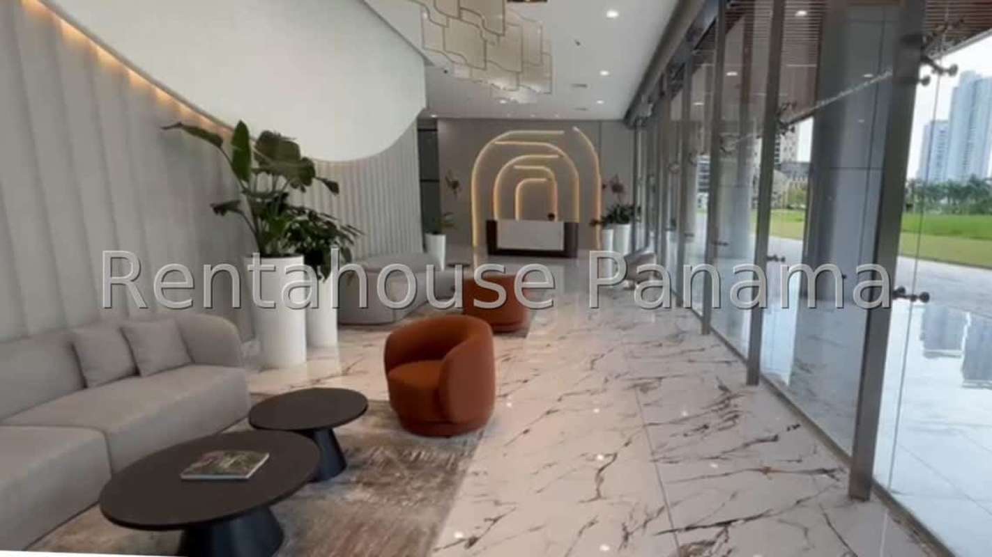 Open kitchen with granite counters, built-in oven, microwave, refrigerator in PH Arcadia Costa del Este