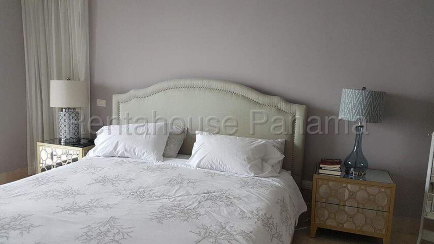 Modern kitchen with granite countertops and stainless steel appliances in PH Yoo Panama apartment