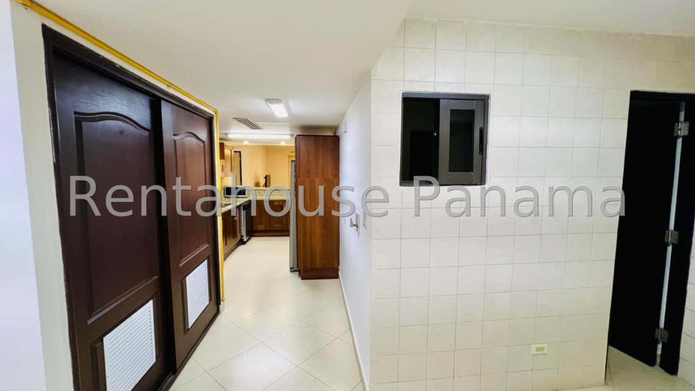 Master bedroom with large windows, closet, garden view Embassy Club Panama