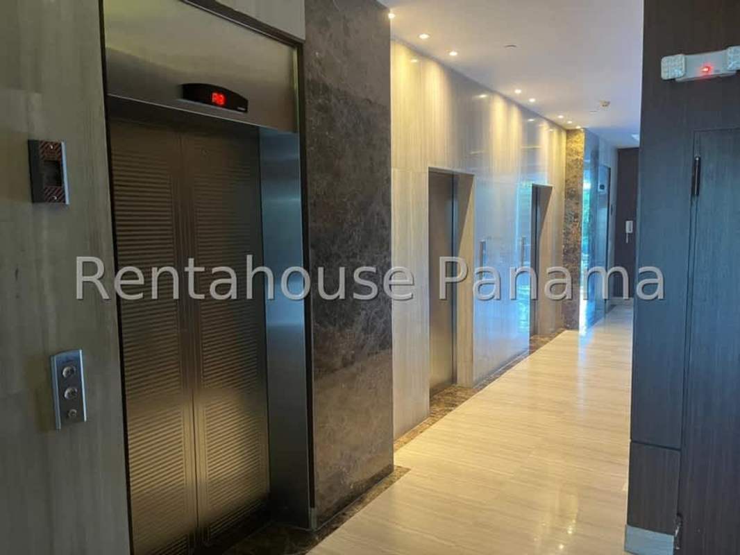 Living room with floor-to-ceiling windows, ocean panorama in PH Costa del Este Panama City