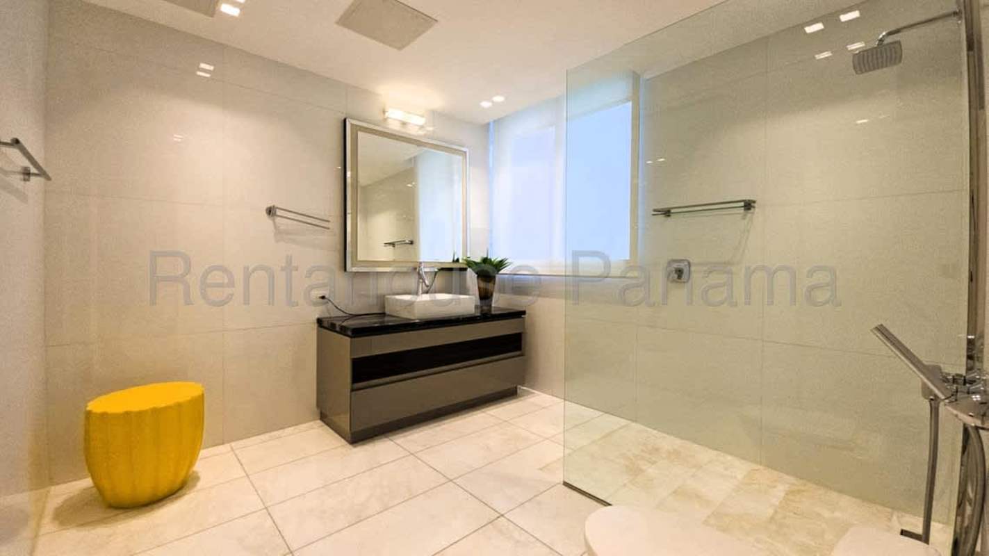 Spacious master bedroom with large ocean view windows at Pacific Point Tower Punta Pacifica