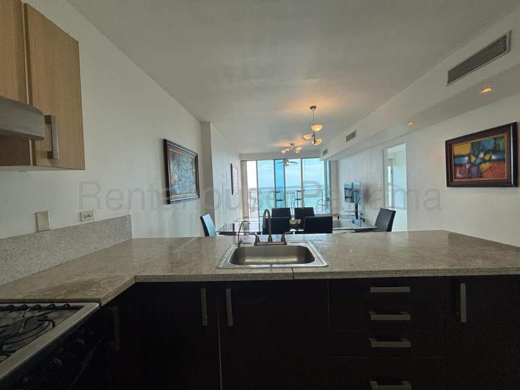 Master bedroom with floor-to-ceiling ocean view windows in PH BICSA Tower Panama City