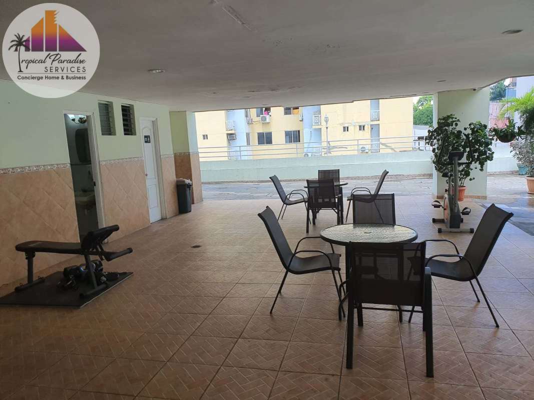 Covered communal area with seating at PH Cristal Park Via Argentina