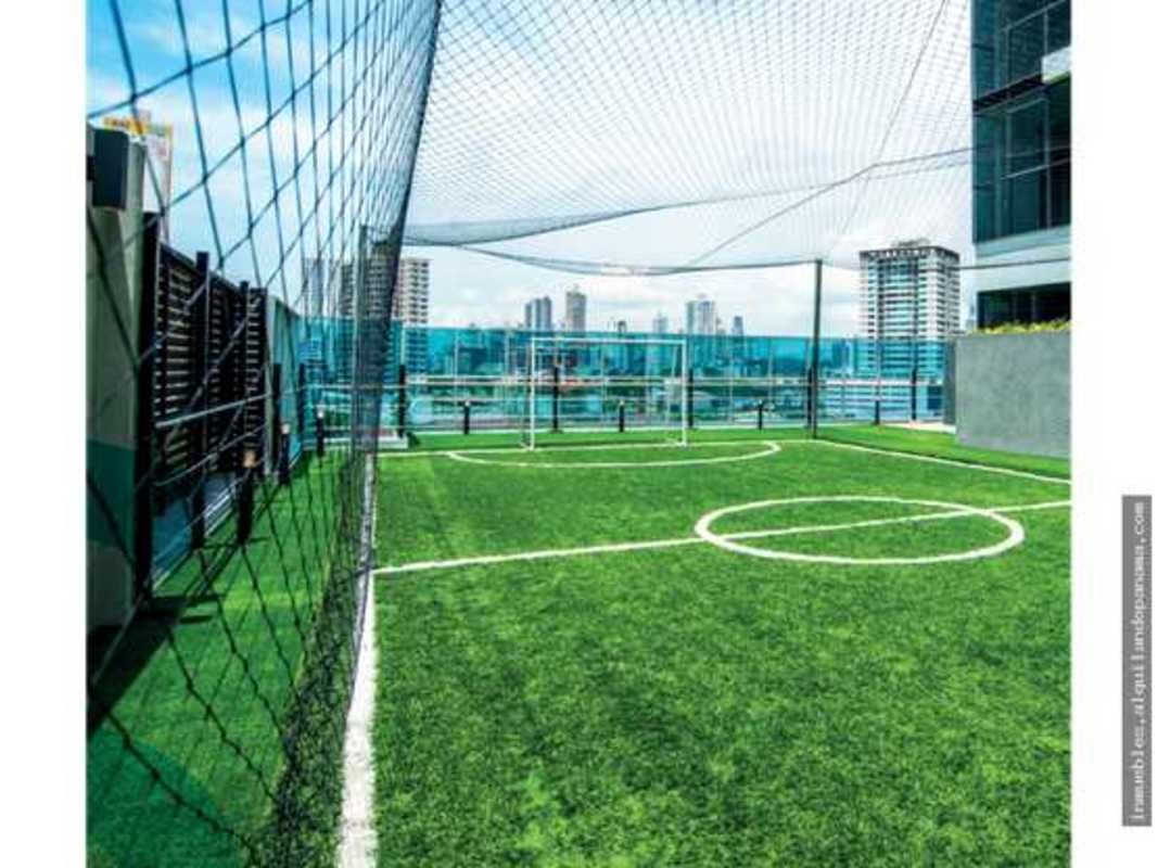 Rooftop soccer court with skyline view PH Park Square Panama