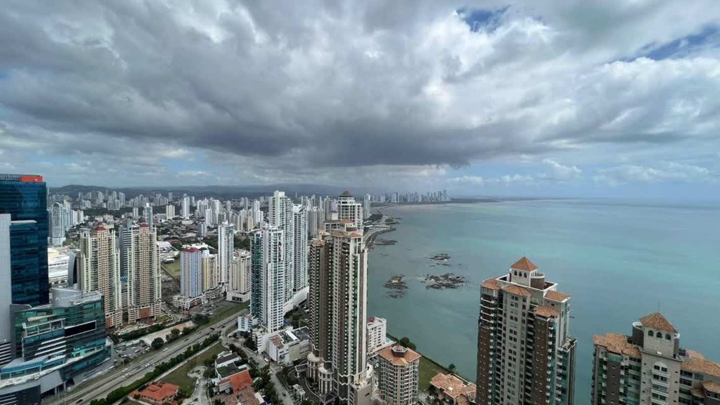 Luxury swimming pool deck waterfall lounge Trump Ocean Club Panama City