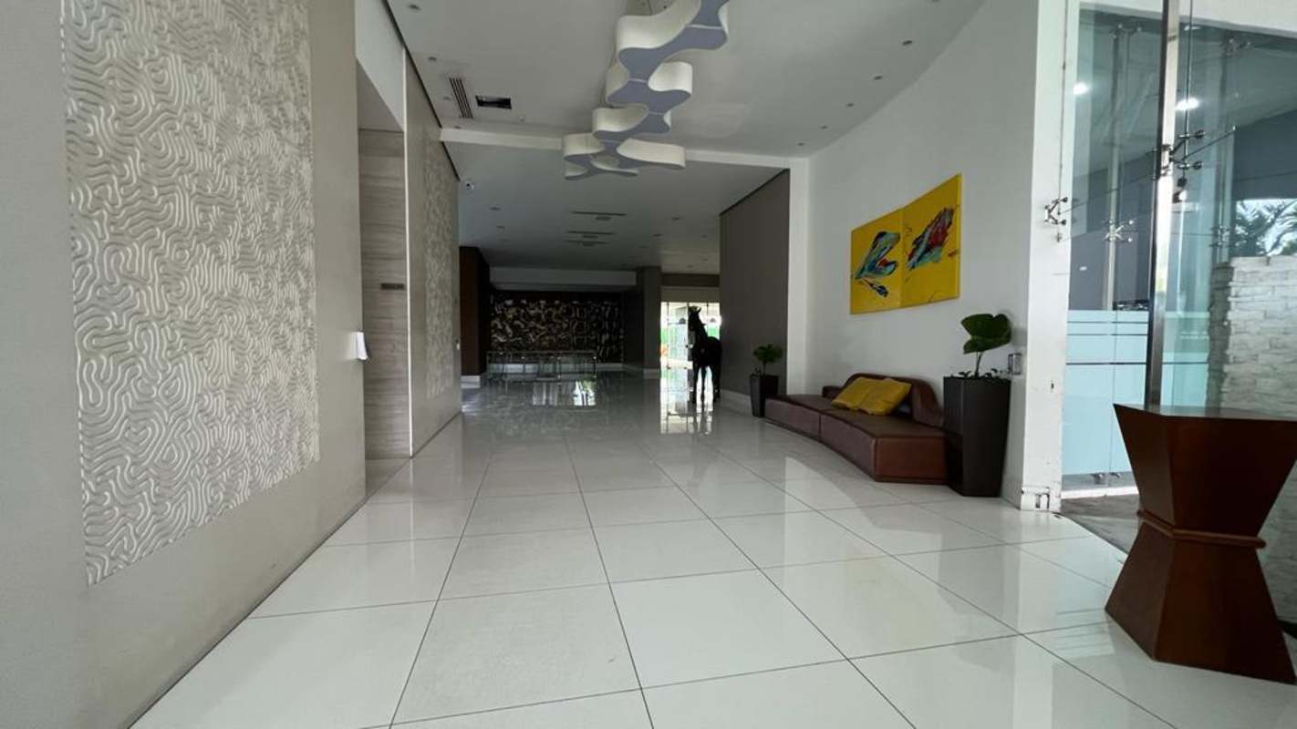 Lobby with floor-to-ceiling windows garden view Trump Ocean Club Panama