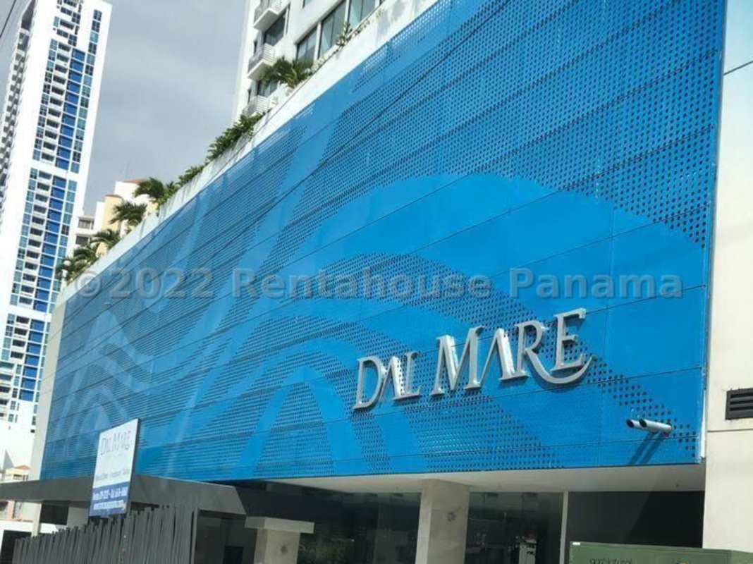 Spacious lobby with blue velvet chairs, marble floors at PH Dal Mare Panama City