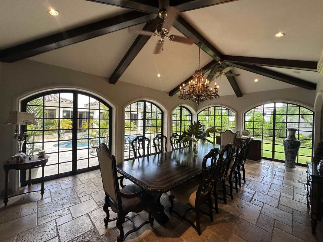 Mediterranean style luxury living room with columns chandeliers marble floors Costa del Este Panama