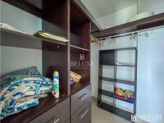 Master bedroom with built-in closet balcony access and ocean view PH Founders Playa Blanca