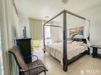 Modern open kitchen with cabinets and breakfast area Playa Blanca PH Founders