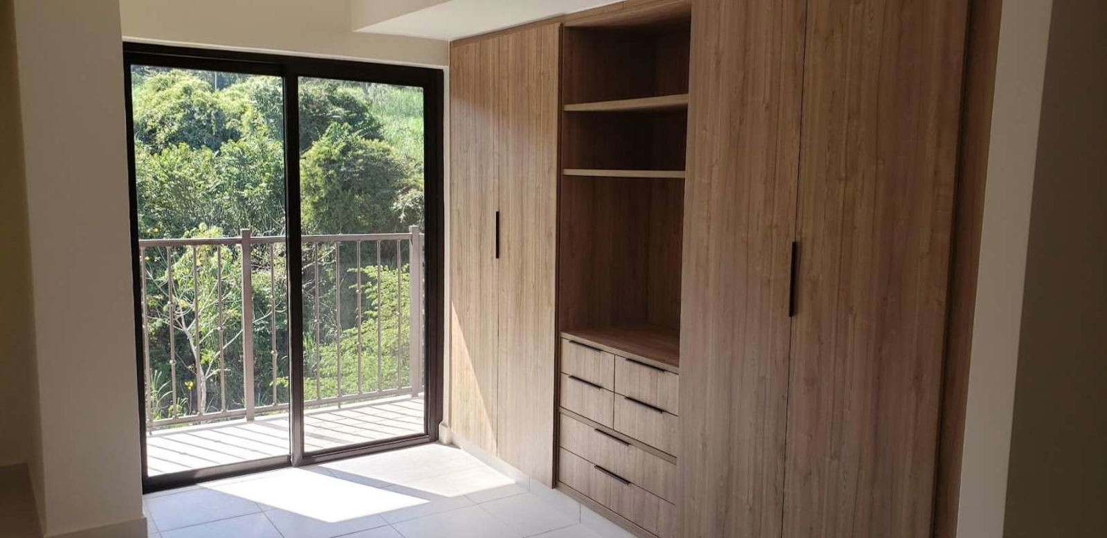 Bedroom featuring wardrobe with drawers Embassy Village Panama