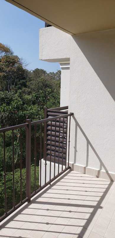 Balcony terrace overlooking lush forest Embassy Village Clayton Panama