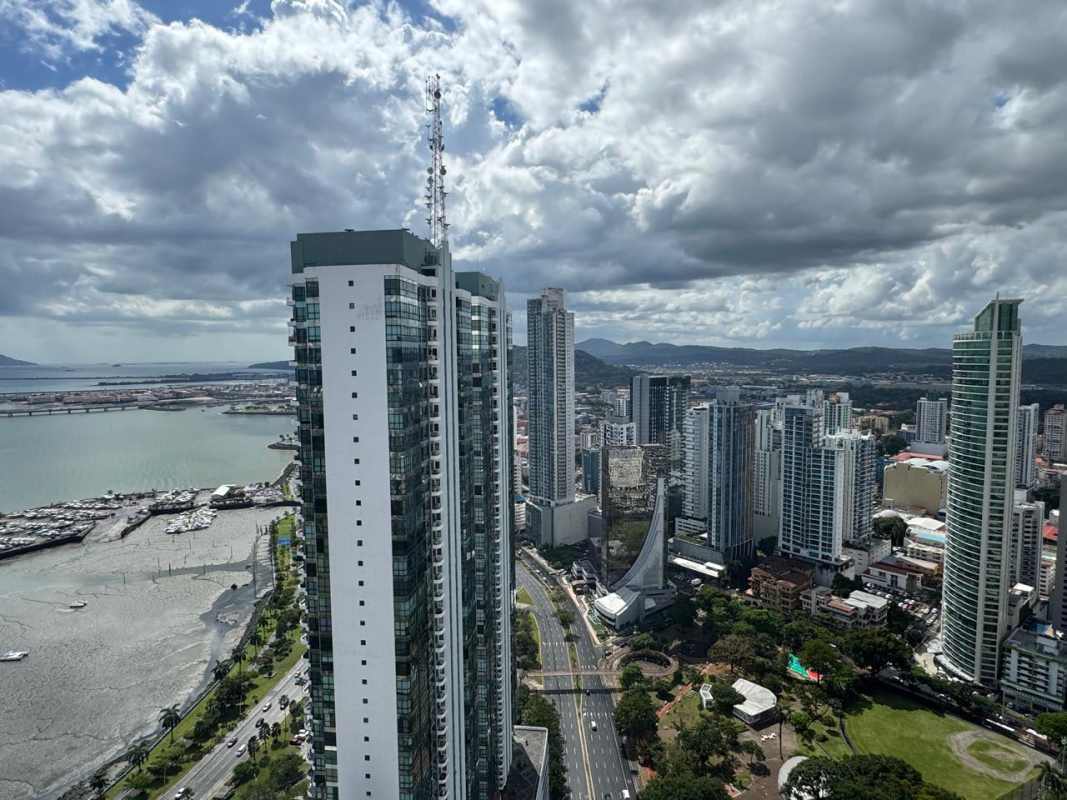 Master bath with marble double vanity jacuzzi tub glass shower ocean views in Vista Marina