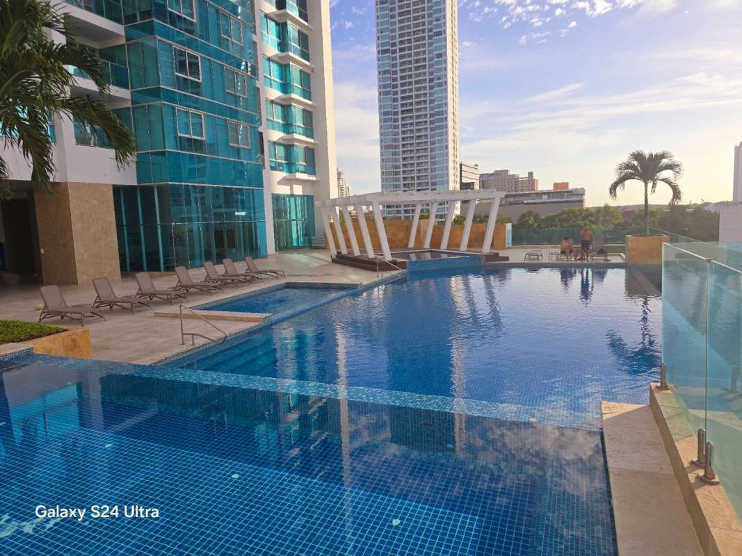 Modern full bathroom with vessel sink, granite counter, mirror in luxury condo PH Titanium Costa del Este Panama
