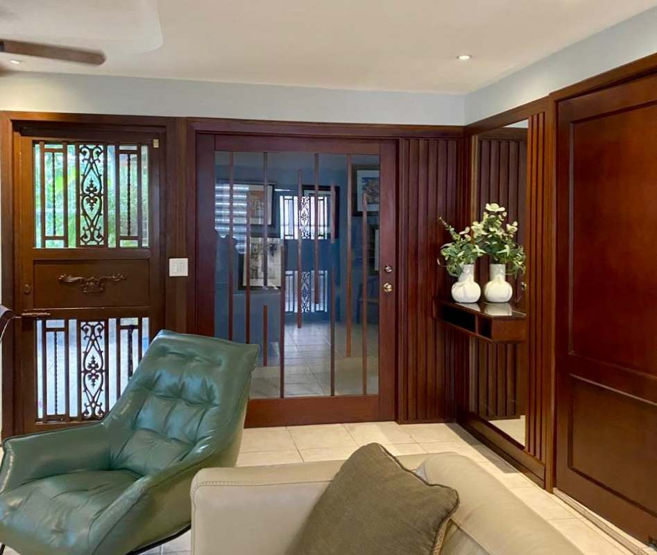 Dining area with patio access bright windows Condado del Rey Panama house for sale