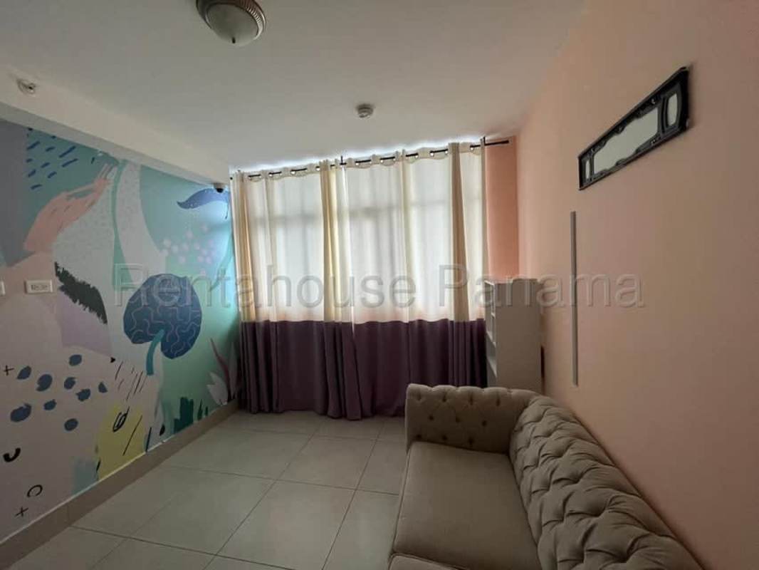 Fully equipped kitchen with appliances, cabinets, and tiled accents in Edison Park Tower apartment Panama