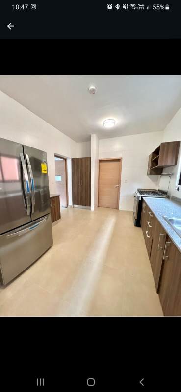 Large bright living room with garden view and tile floor in Clayton Forest Panama