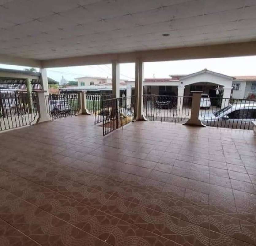 Large covered veranda with parking view at house in Cerro Viento neighborhood Panama City