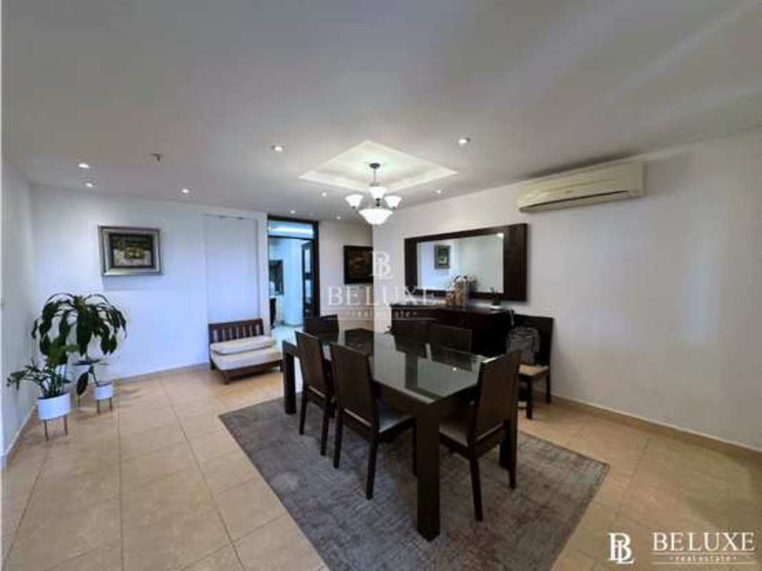 Second bedroom with large window city views PH Parque del Mar II Costa del Este Panama