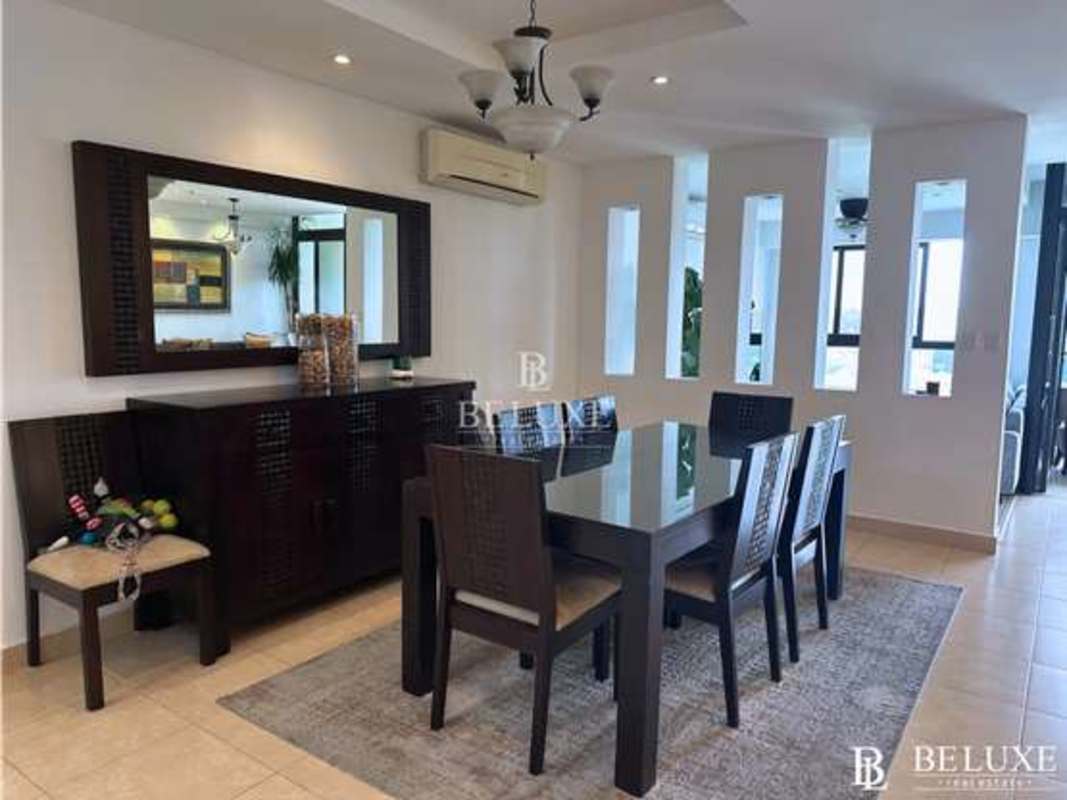 Main bedroom with walk-in closet and city views PH Parque del Mar II Costa del Este Panama City