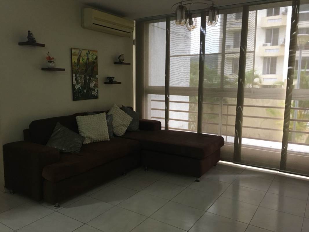 Entrance of PH McGregor Heights with modern gate security booth and balconies Panama City