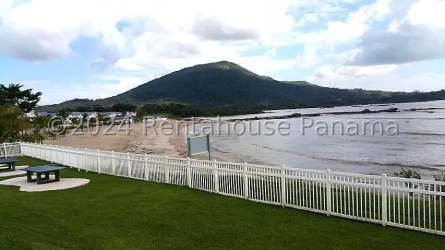 Main living dining area with large glass door terrace access at PH Vista Azul Playa Dorada Panama Oeste