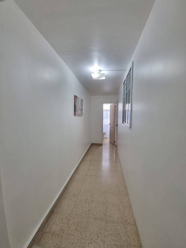 Modern bathroom with vanity, mirror and shower in apartment for rent in Bella Vista Panama City