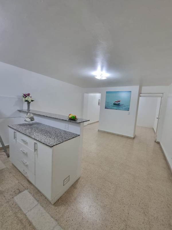 Minimalist kitchen dining open concept with granite counter in Bella Vista rental Panama