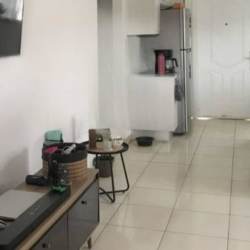 Living space with access to kitchen and natural lighting in Colinas del Oeste