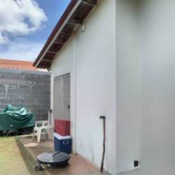 Exterior house view with fenced yard at Colinas del Oeste, Arraiján