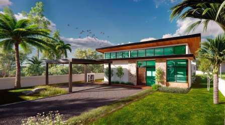 Modern tropical home with large windows carport landscaped garden spacious lawn Costa Esmeralda San Carlos Panama