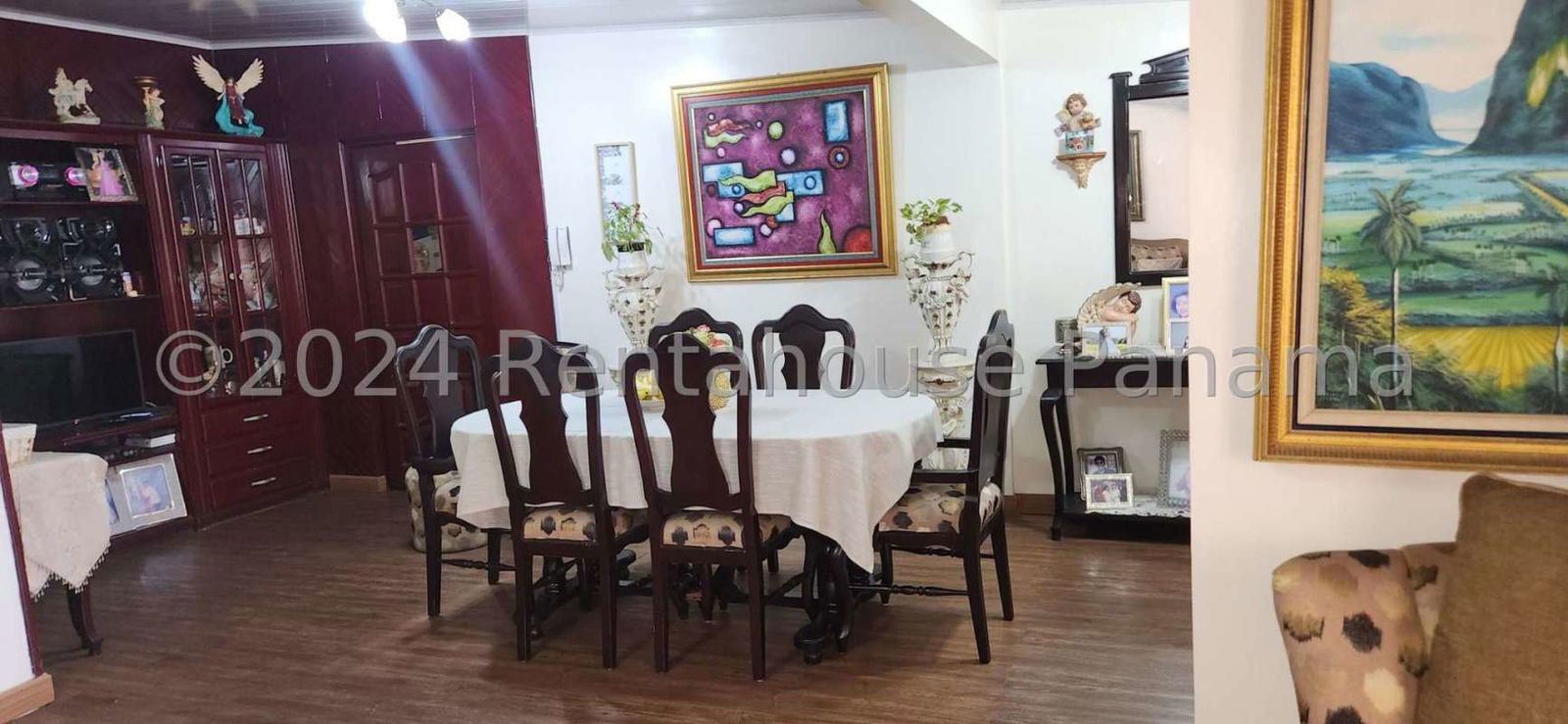 Single story gated homes with tiled roofs on residential street near Fernandez de Cordoba Panama City