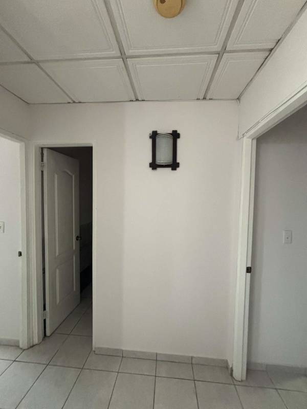 Modern kitchen with granite counters, stainless appliances in Torres de Milan apartment Condado del Rey