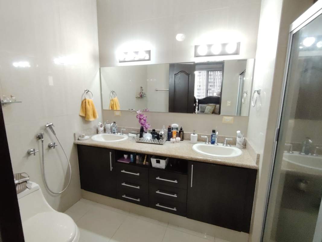 Bedroom with built-in closet AC and window city view PH Windows Tower Panama City